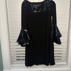 super fun dress ! love the sleeves and sparkles !